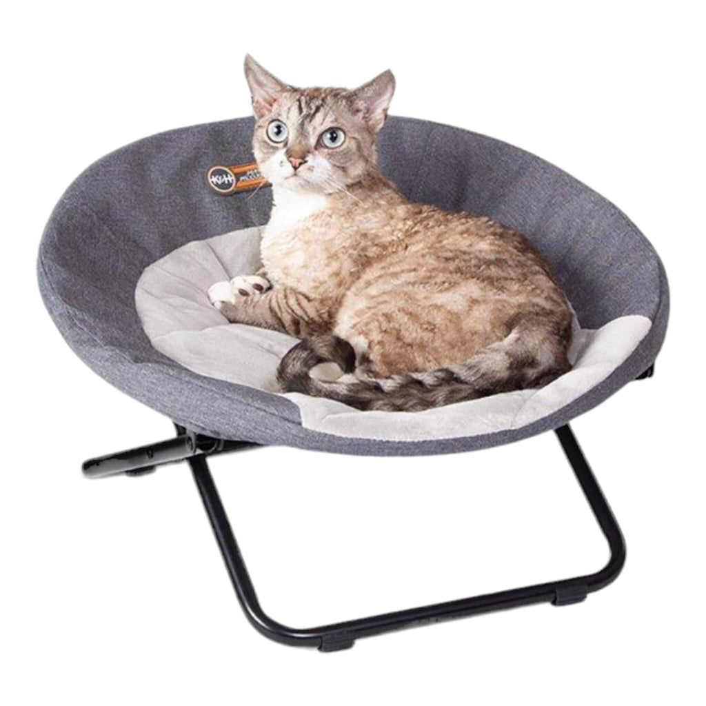 Cat snuggles on the Elevated Cozy Pet Cot